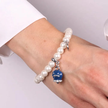 Bracciale in Metallo Bracciale in Metallo con perle e campanella portafortuna in smalto blu con scritta Capri