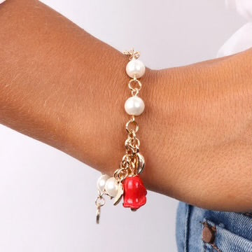 Bracciale in Metallo con perle, foglie e campanella a forma di rosa impreziosita da smalti colorati